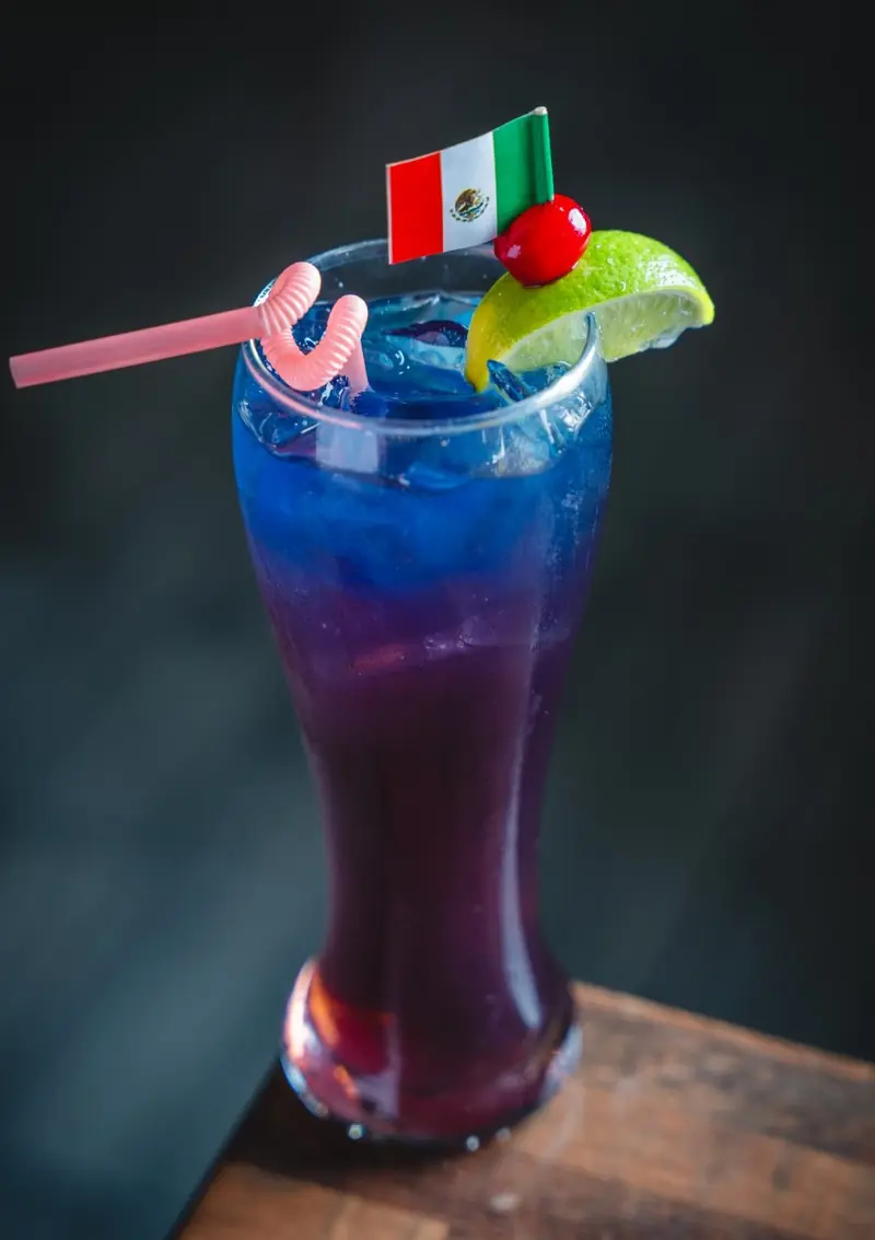 Layered blue and purple cocktail