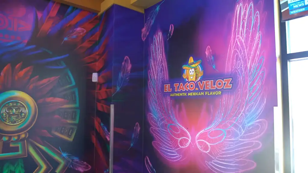The El Taco Veloz wings mural inside the restaurant