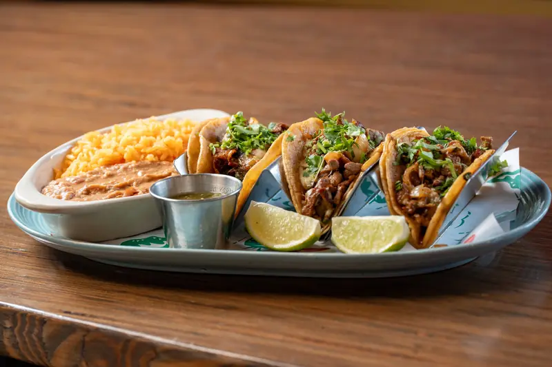 Street tacos platter with rice and beans