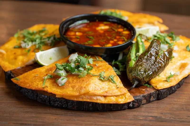 Quesabirria wedges with consome
